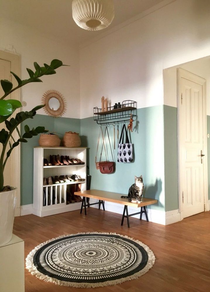 Meia parede delimitando espaço na sala